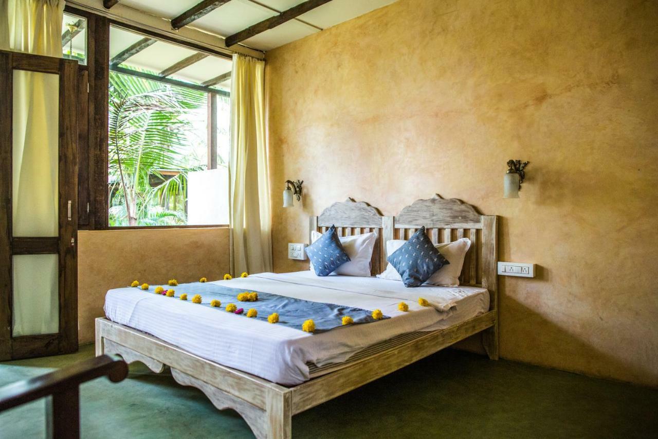 Devarya Wellness Beach Resort Morjim Rom bilde